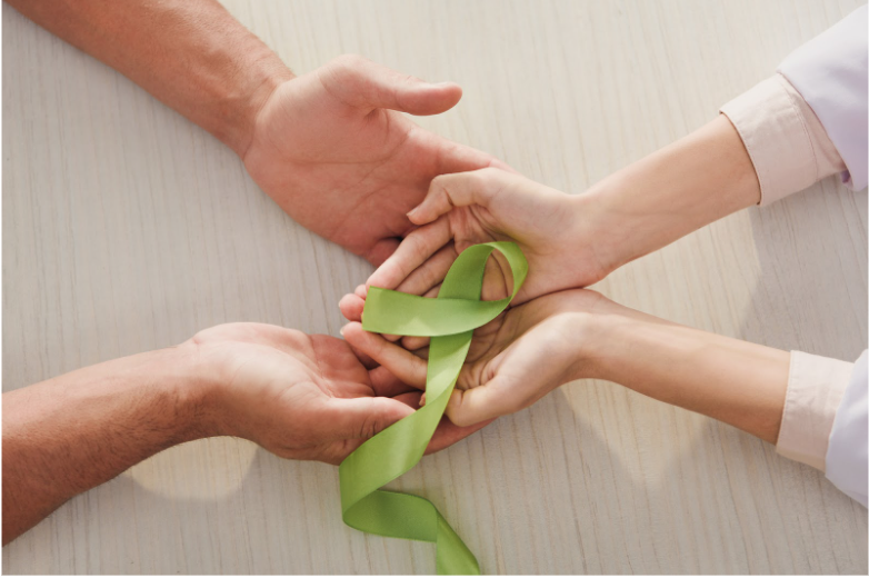 Mental health day green ribbon as a symbol