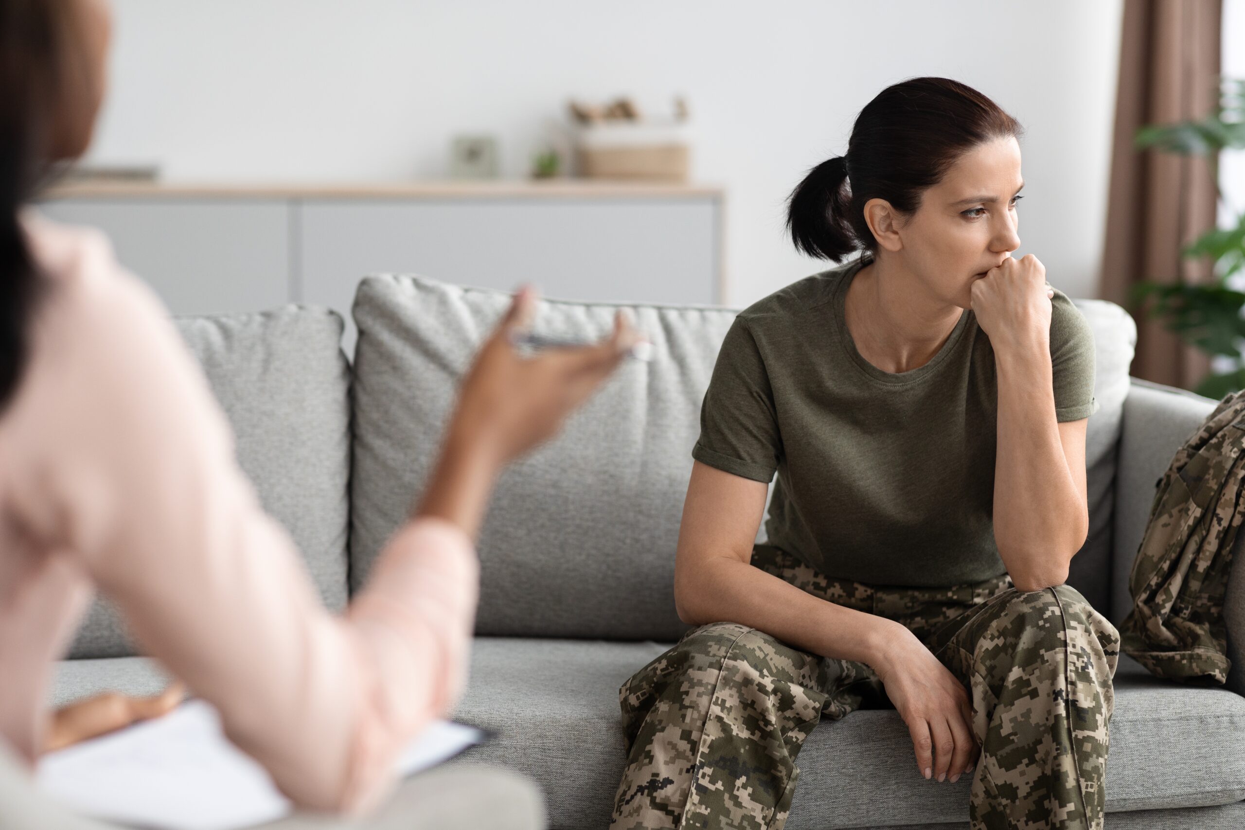 female solider visiting with a mental health clinic in Frisco, Texas over her PTSD