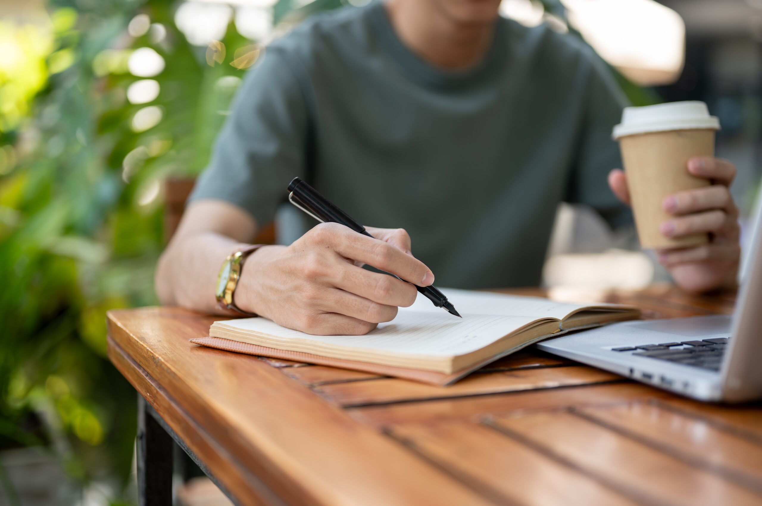 man drinking coffee while developing a relapse prevention plan